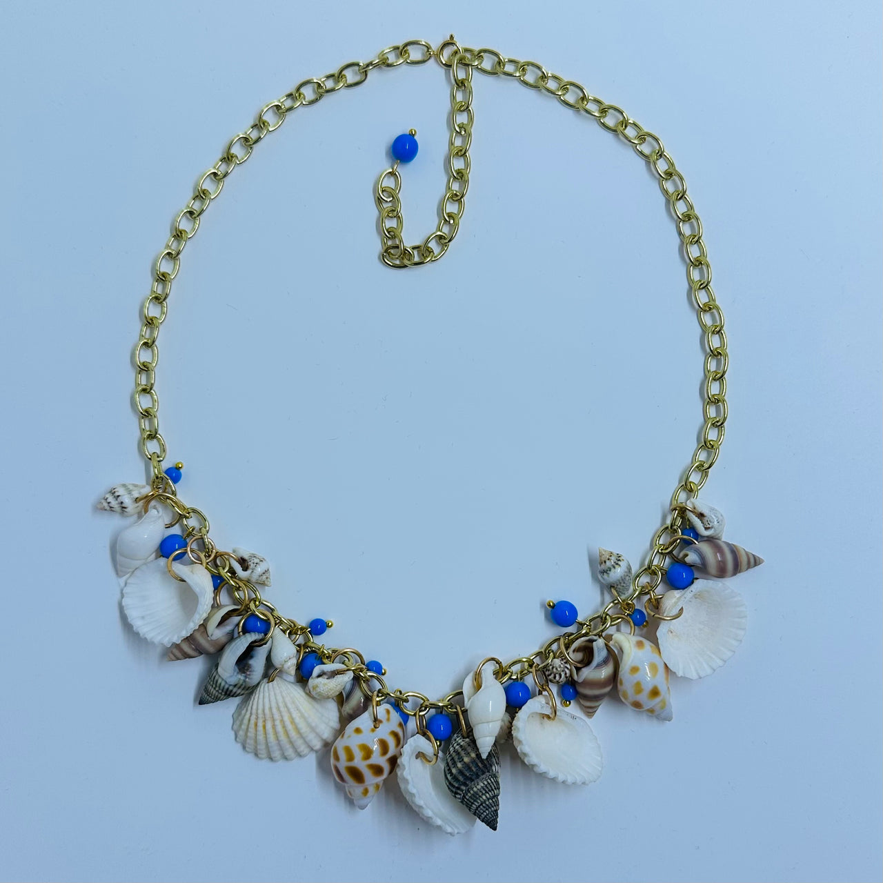 Metal Haskell Shell Striking Necklace in Blue