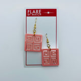 Flare Tiki Tapa Dangler Earrings in Light Pink