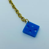 Flare Tiki Tapa Necklace in Bright Blue